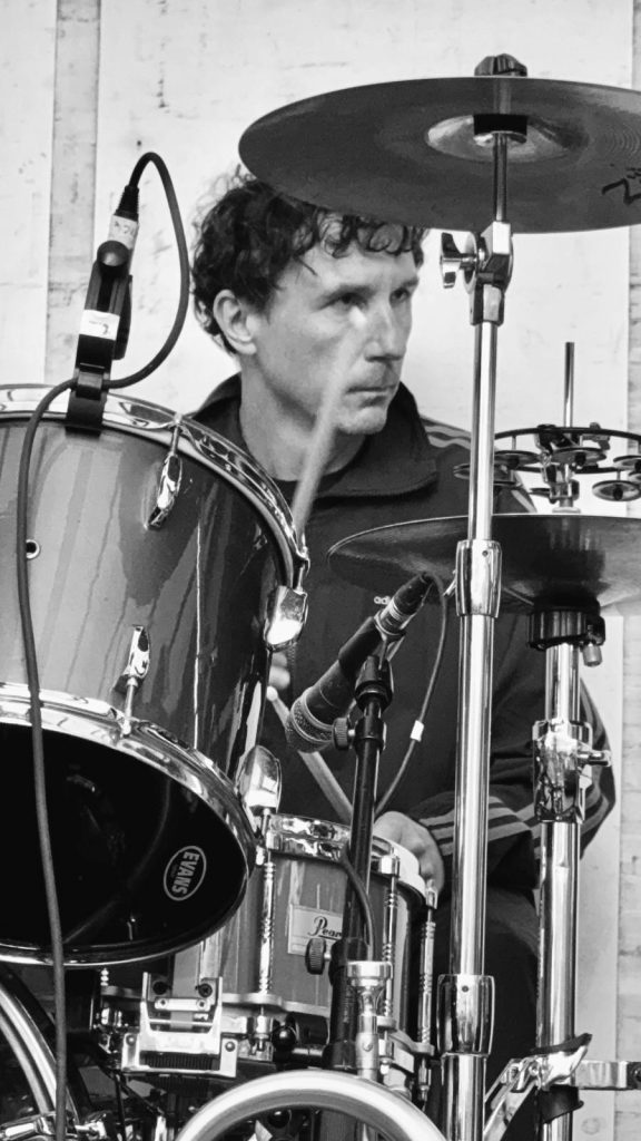 Ben K playing the drums